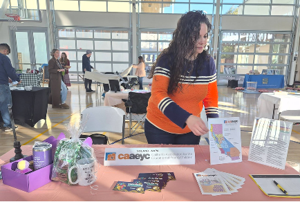 Women setting up event table